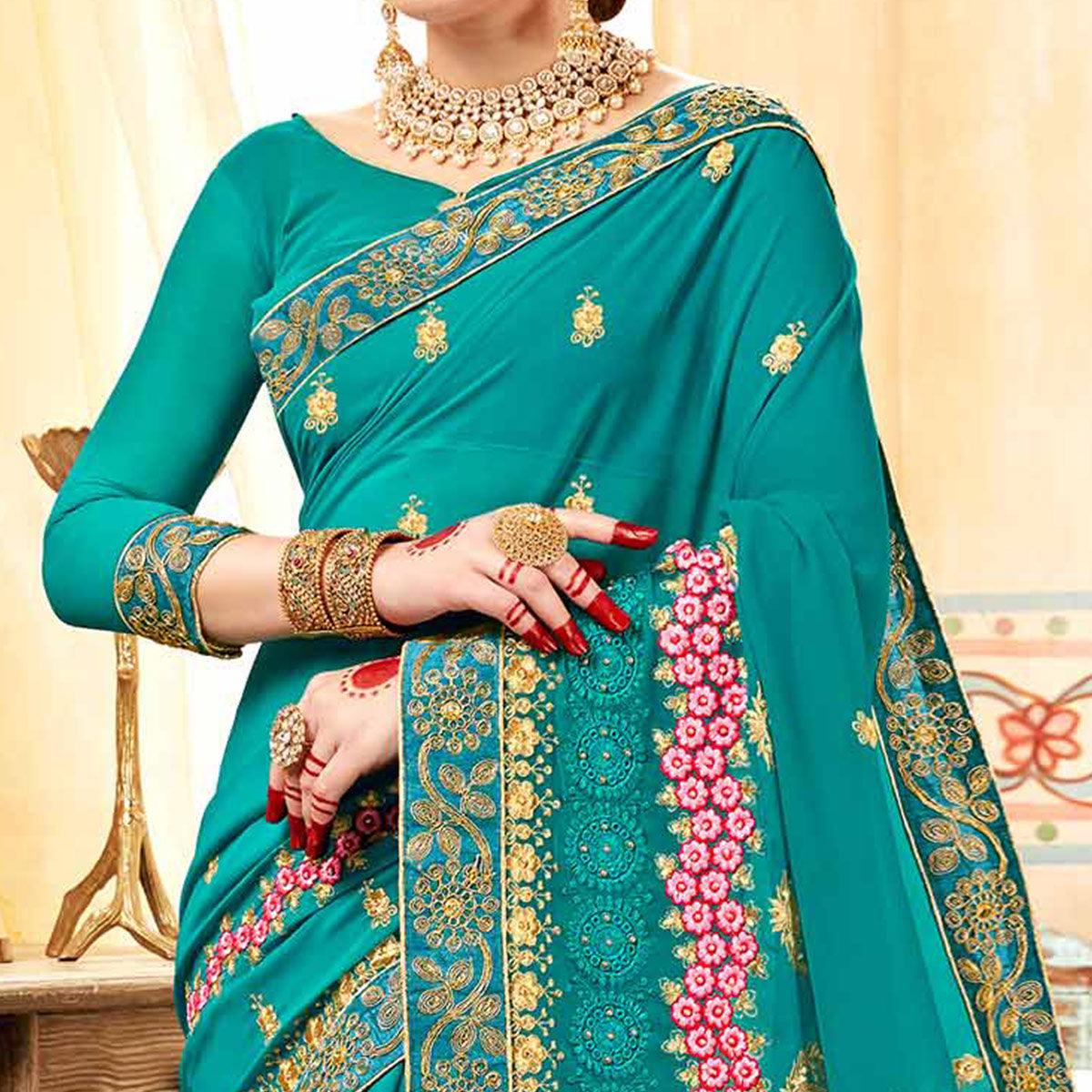 Exceptional Aqua Blue Colored Partywear Embroidered Georgette Saree