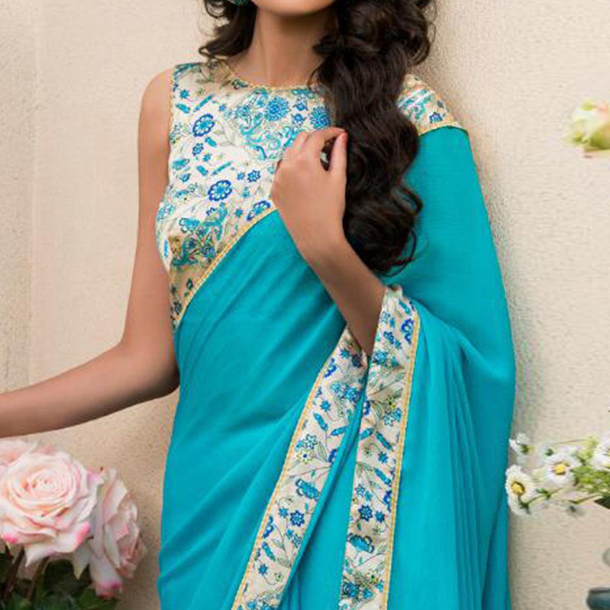 Exceptional Aqua Blue Colored Partywear Printed Chiffon Saree