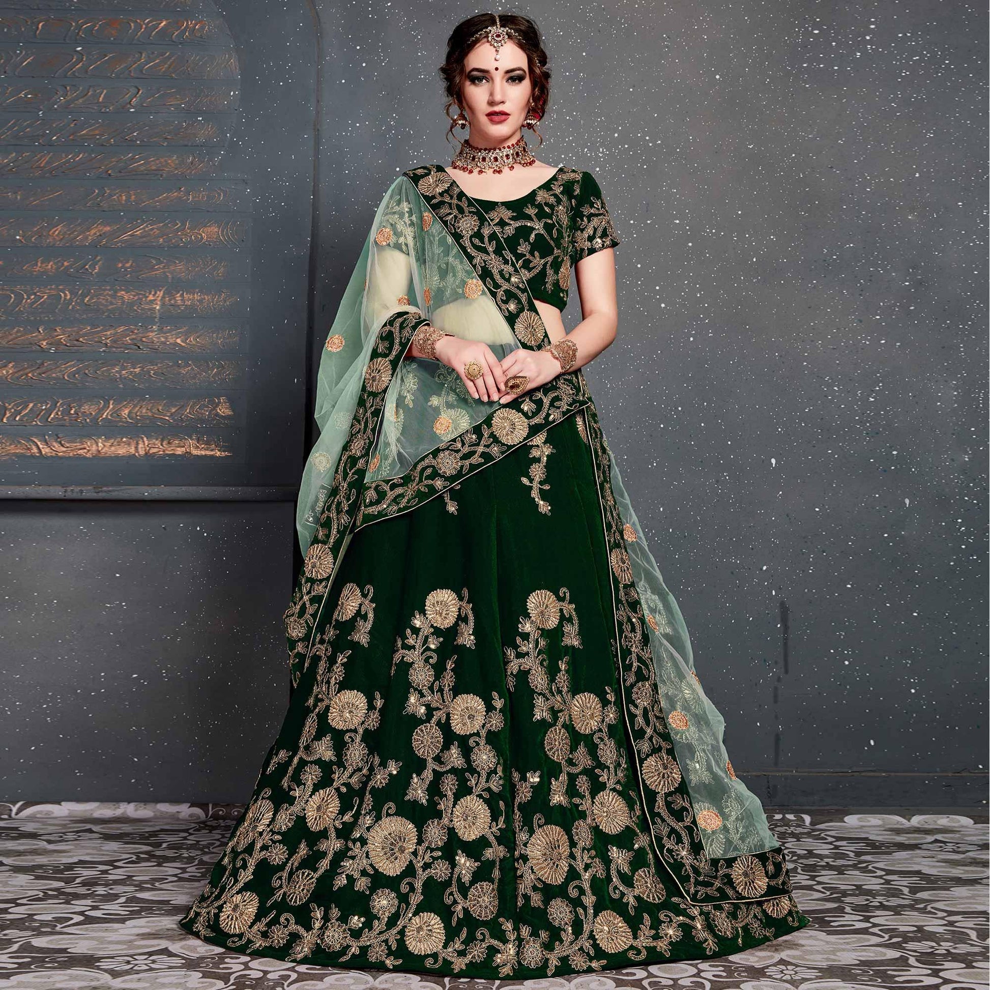 Exceptional Dark Green Colored Wedding Wear Embroidered Velvet Lehenga Choli