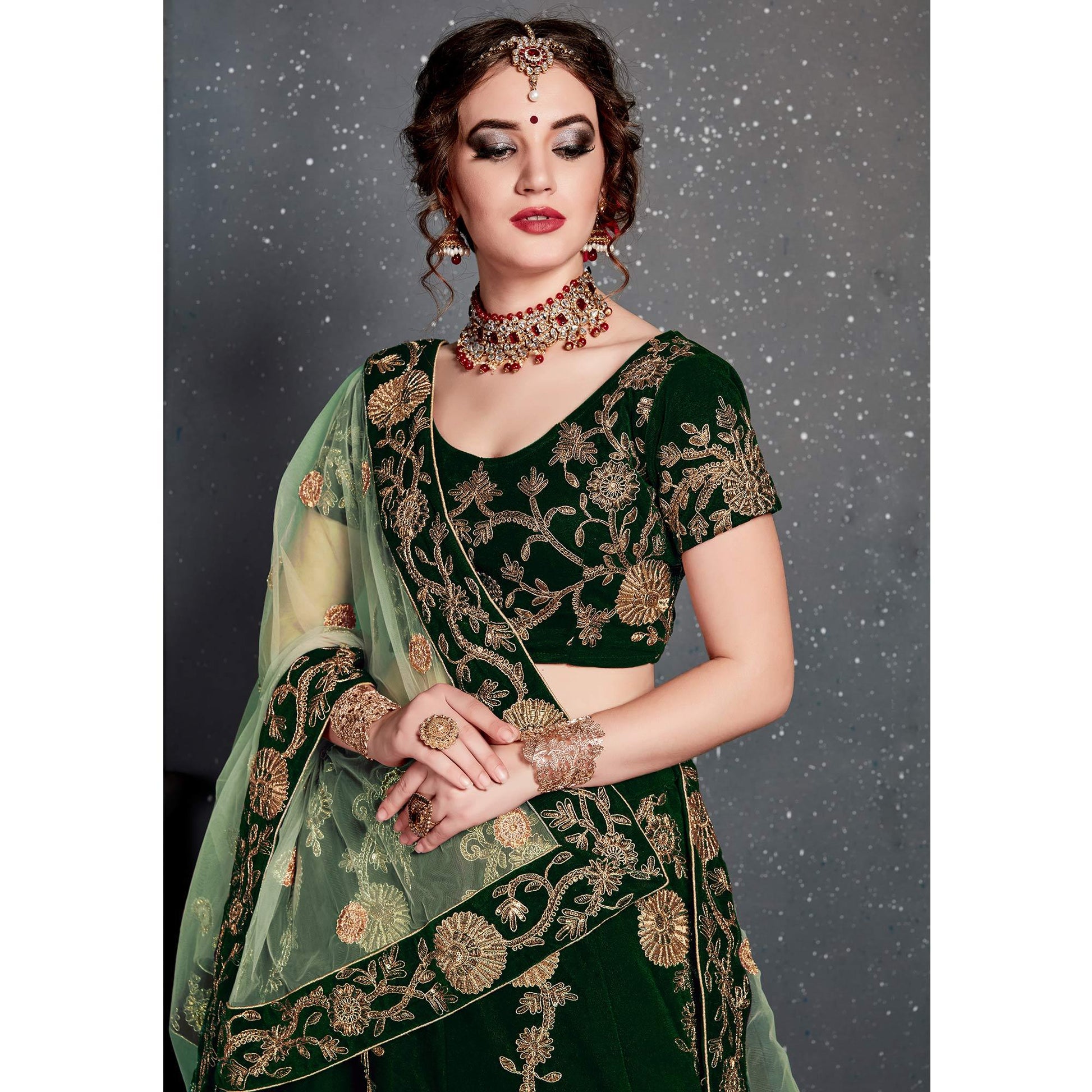 Exceptional Dark Green Colored Wedding Wear Embroidered Velvet Lehenga Choli