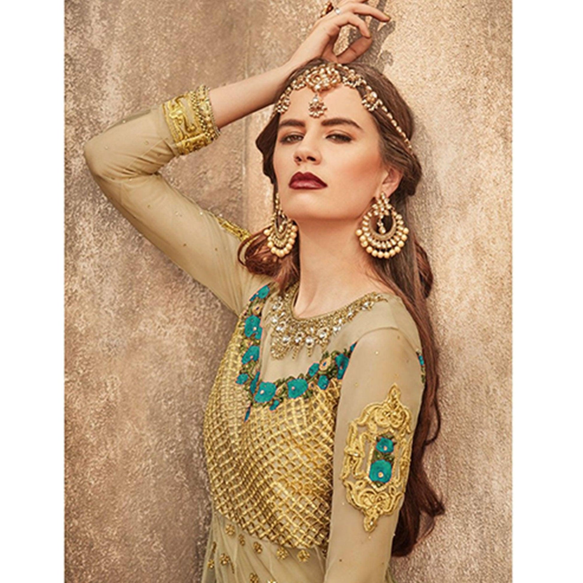 Exceptional Golden-Turquoise Colored Party Wear Embroidered Net Lehenga Choli