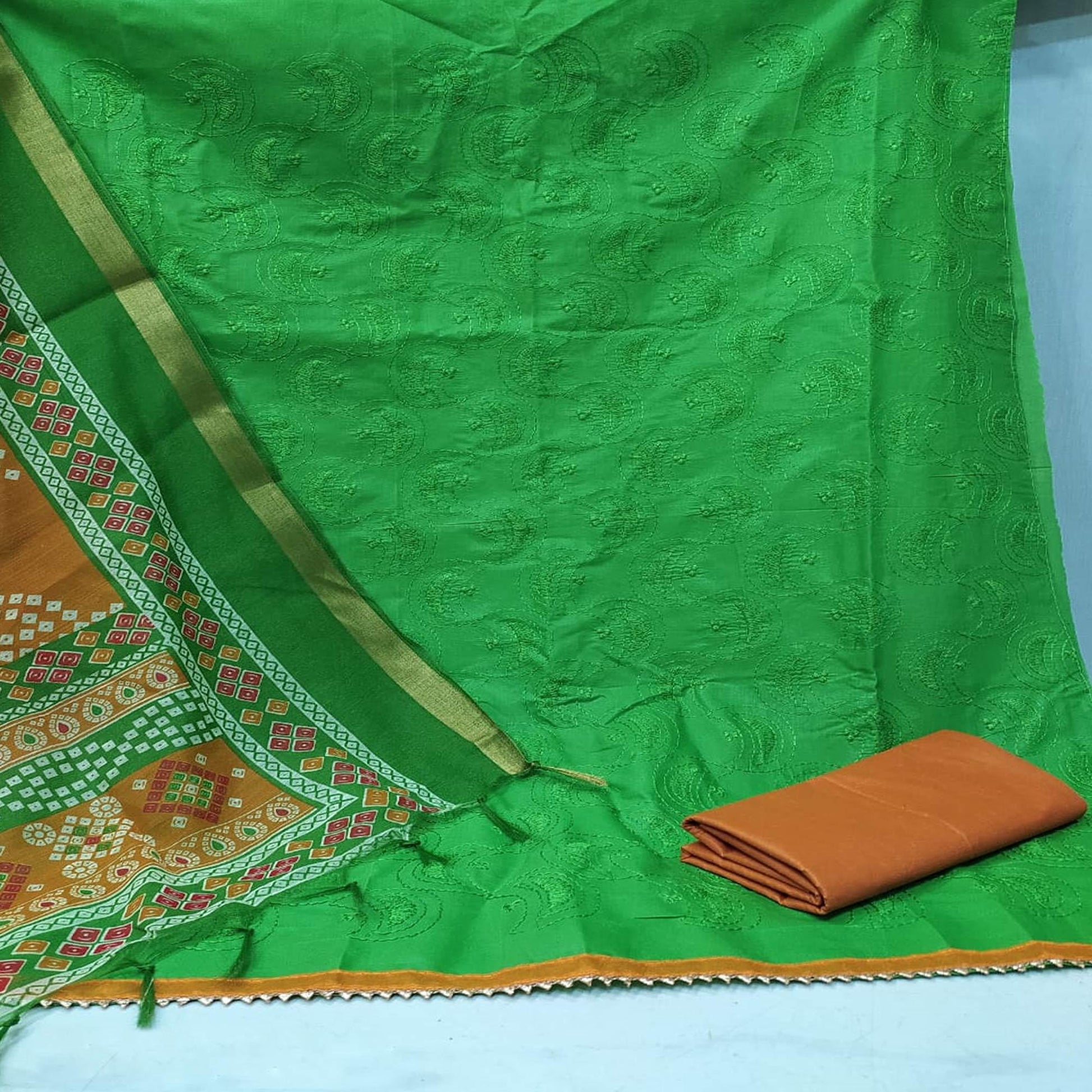 Exceptional Green Colored Casual Wear Embroidered Cotton Dress Material