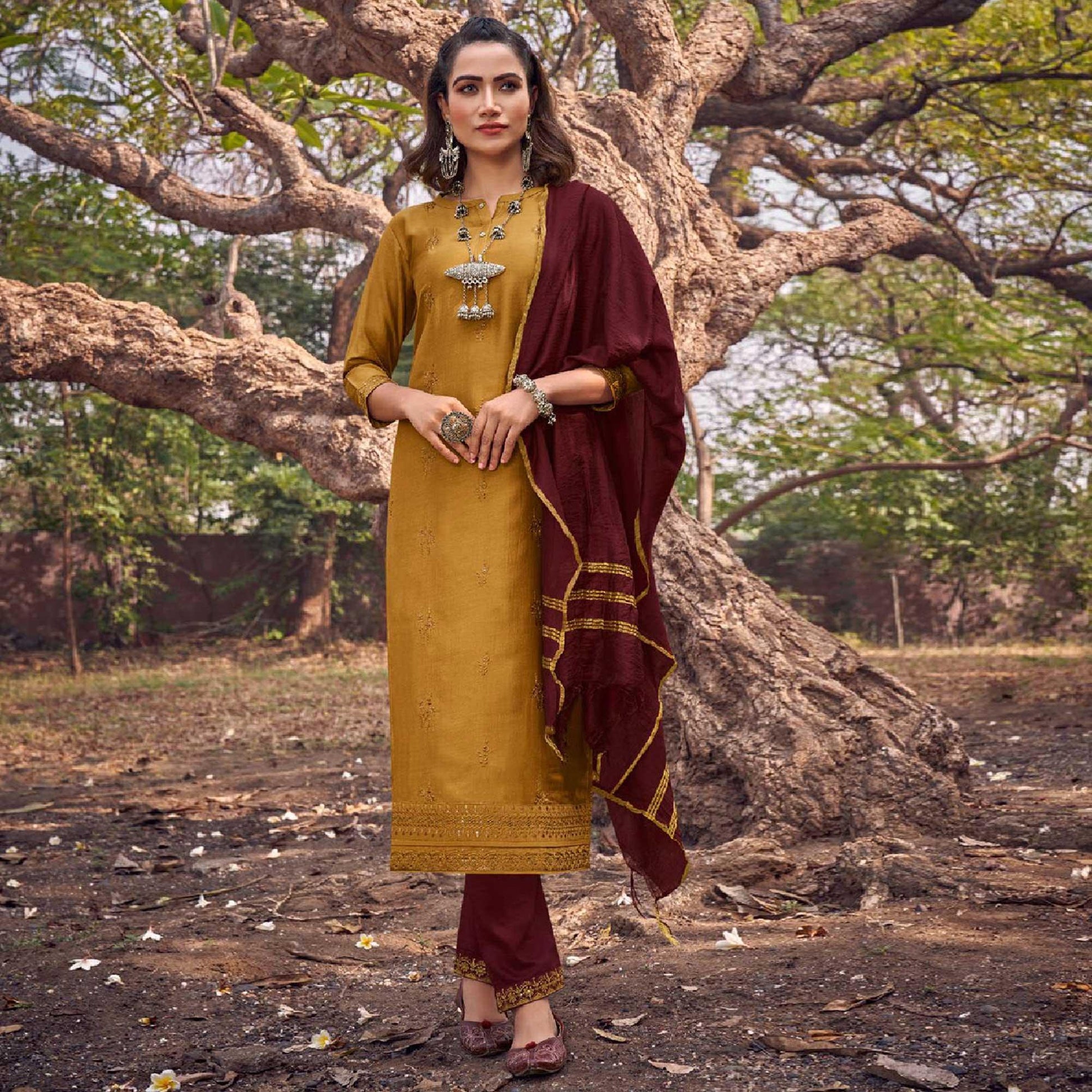 Exceptional Yellow Colored Partywear Embroidered Cotton Silk Straight Suit