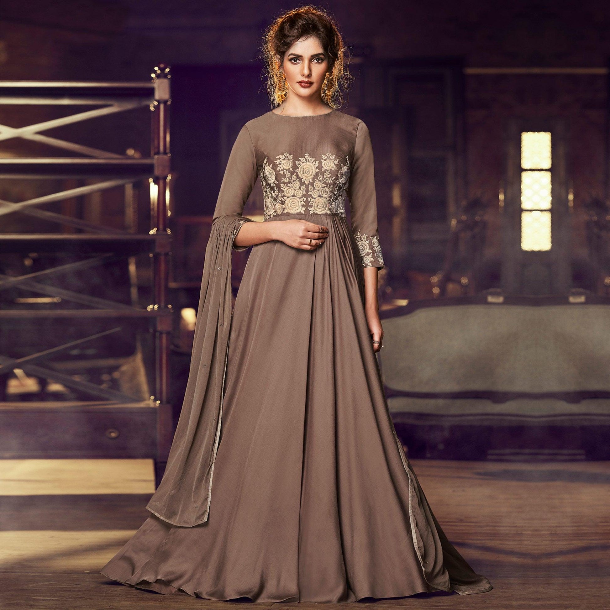 Exclusive Brown Colored Partywear Embroidered Modal Satin Gown With Dupatta