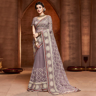 Exclusive Mauve Coloured Partywear Embroidered Soft Net Saree