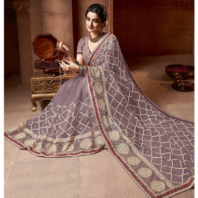 Exclusive Mauve Coloured Partywear Embroidered Soft Net Saree