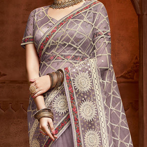 Exclusive Mauve Coloured Partywear Embroidered Soft Net Saree