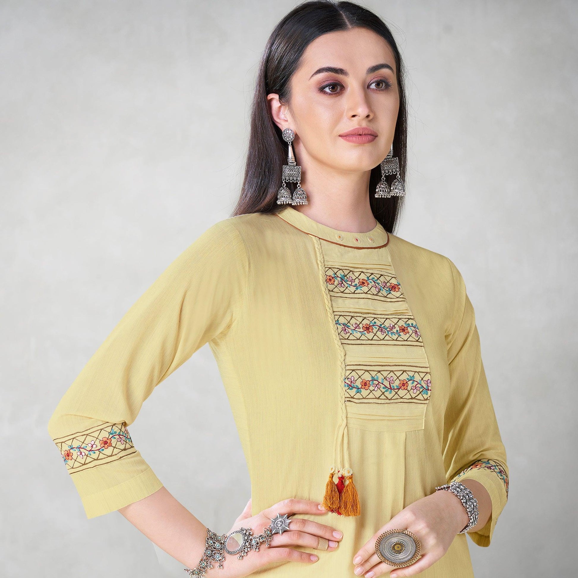 Exclusive Pastel Yellow Colored Partywear Embroidered Viscose Kurti