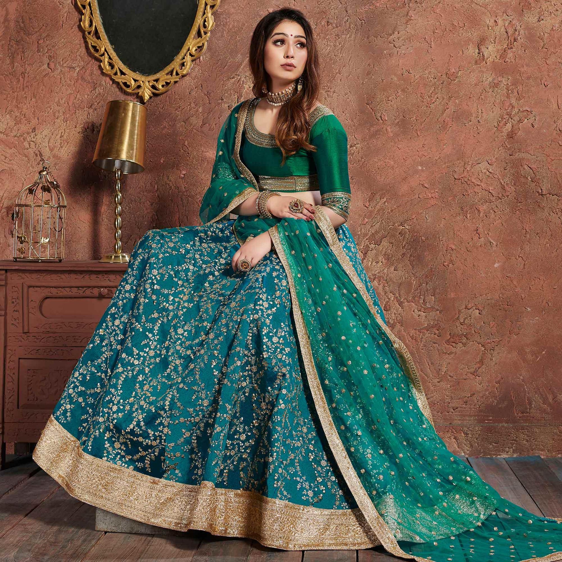 Exclusive Turquoise Green Colored Wedding Wear Embroidered Art Silk Lehenga Choli