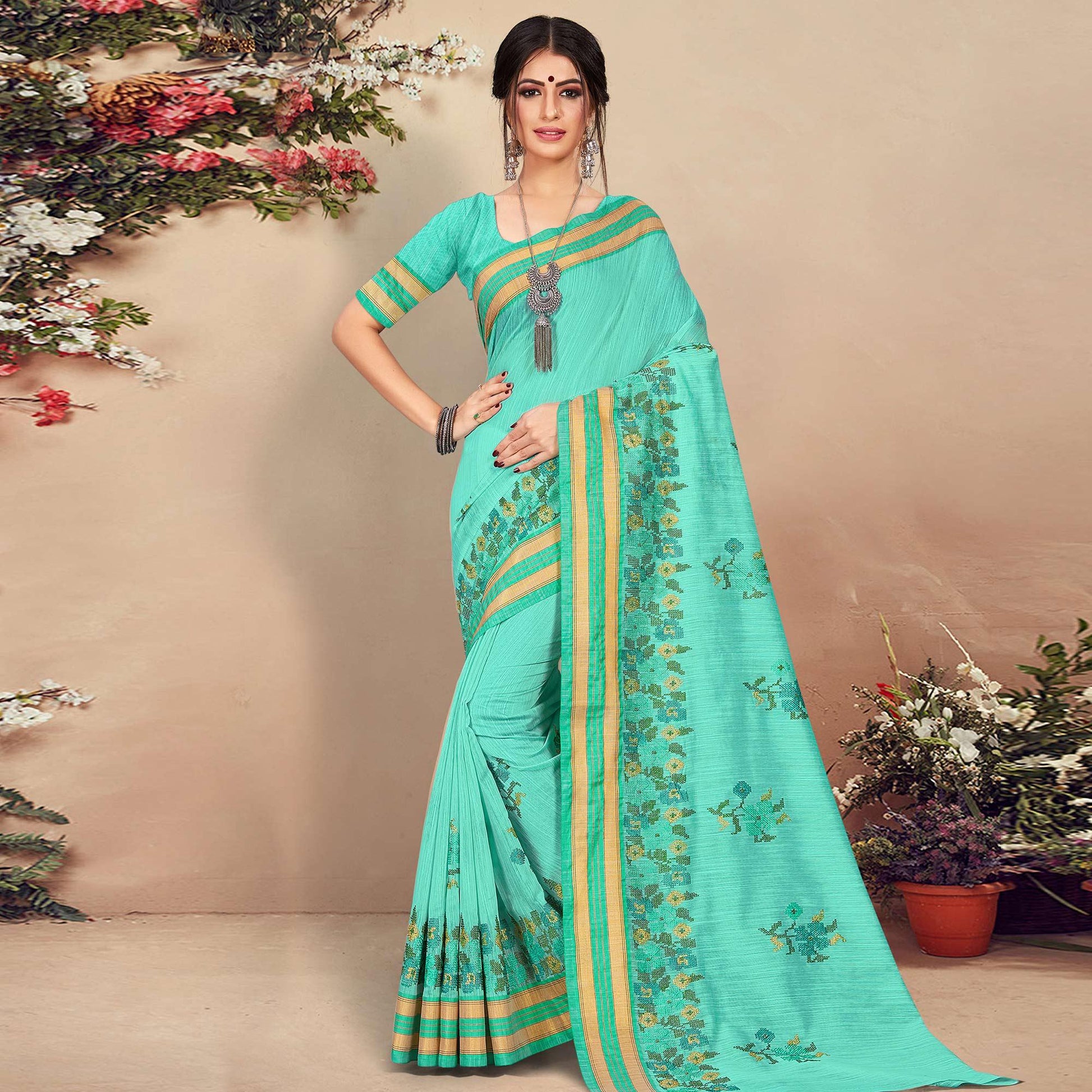 Exotic Aqua Blue Colored Casual Wear Floral Printed Cotton Saree