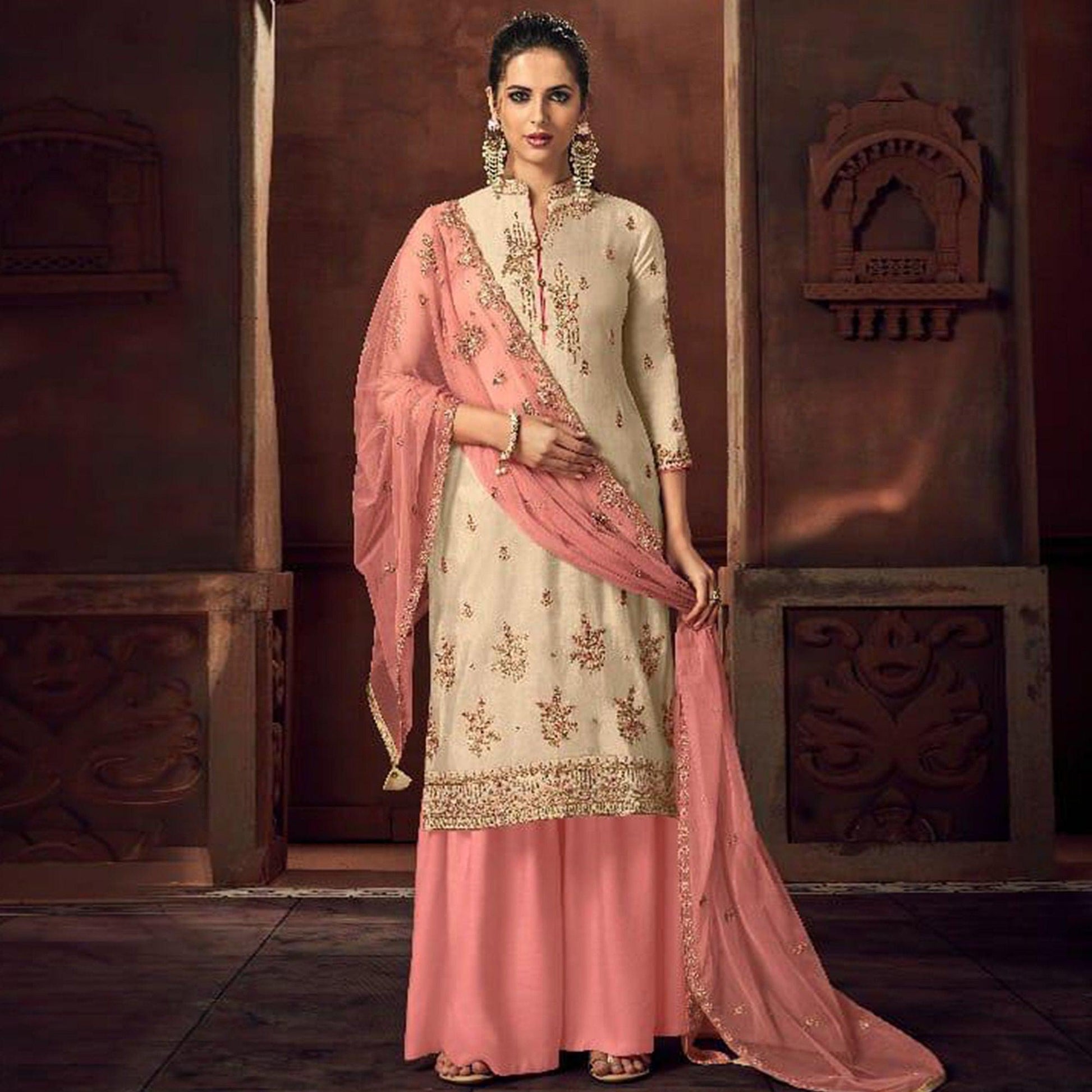 Exotic Cream Colored Party Wear Embroidered Tussar Silk Palazzo Suit