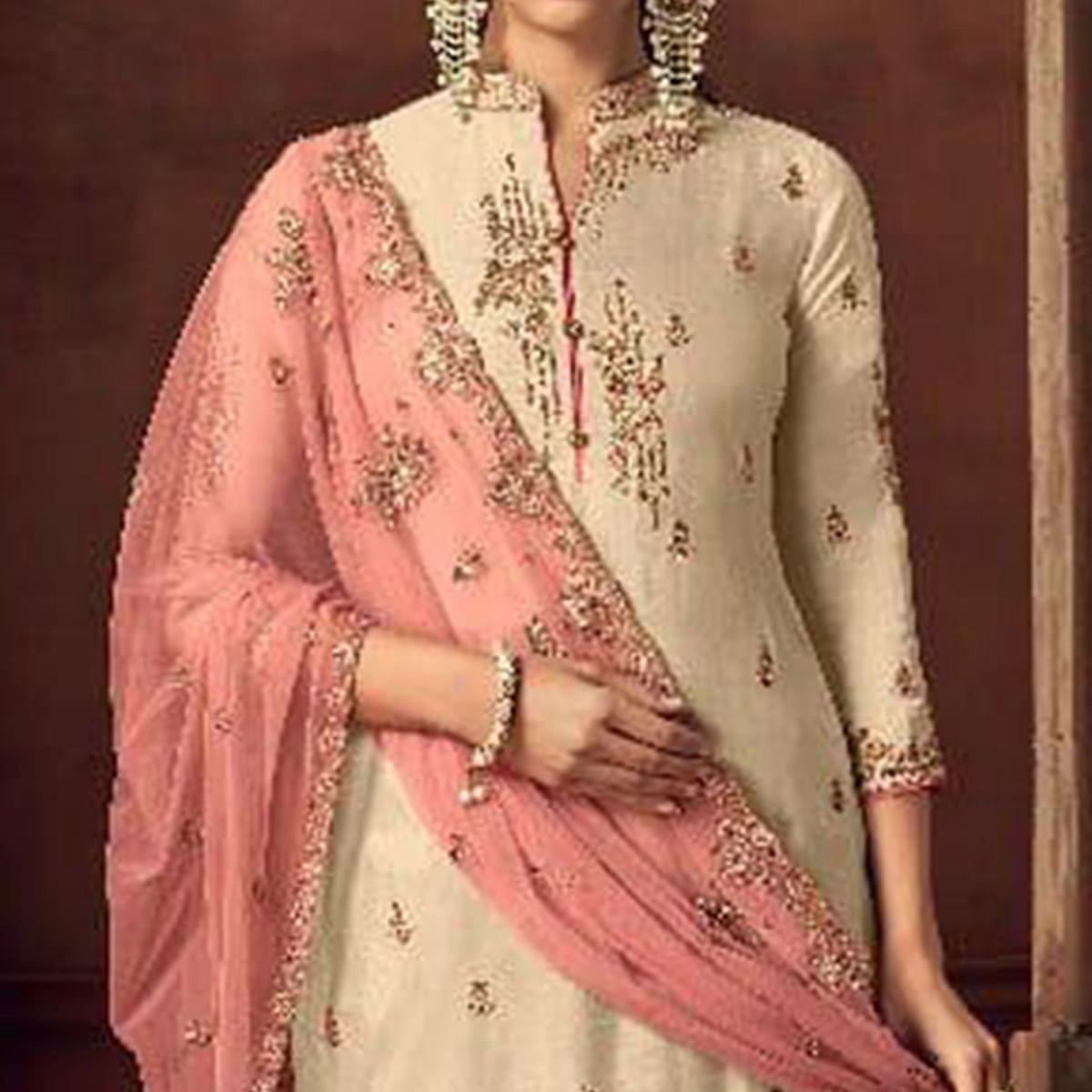 Exotic Cream Colored Party Wear Embroidered Tussar Silk Palazzo Suit