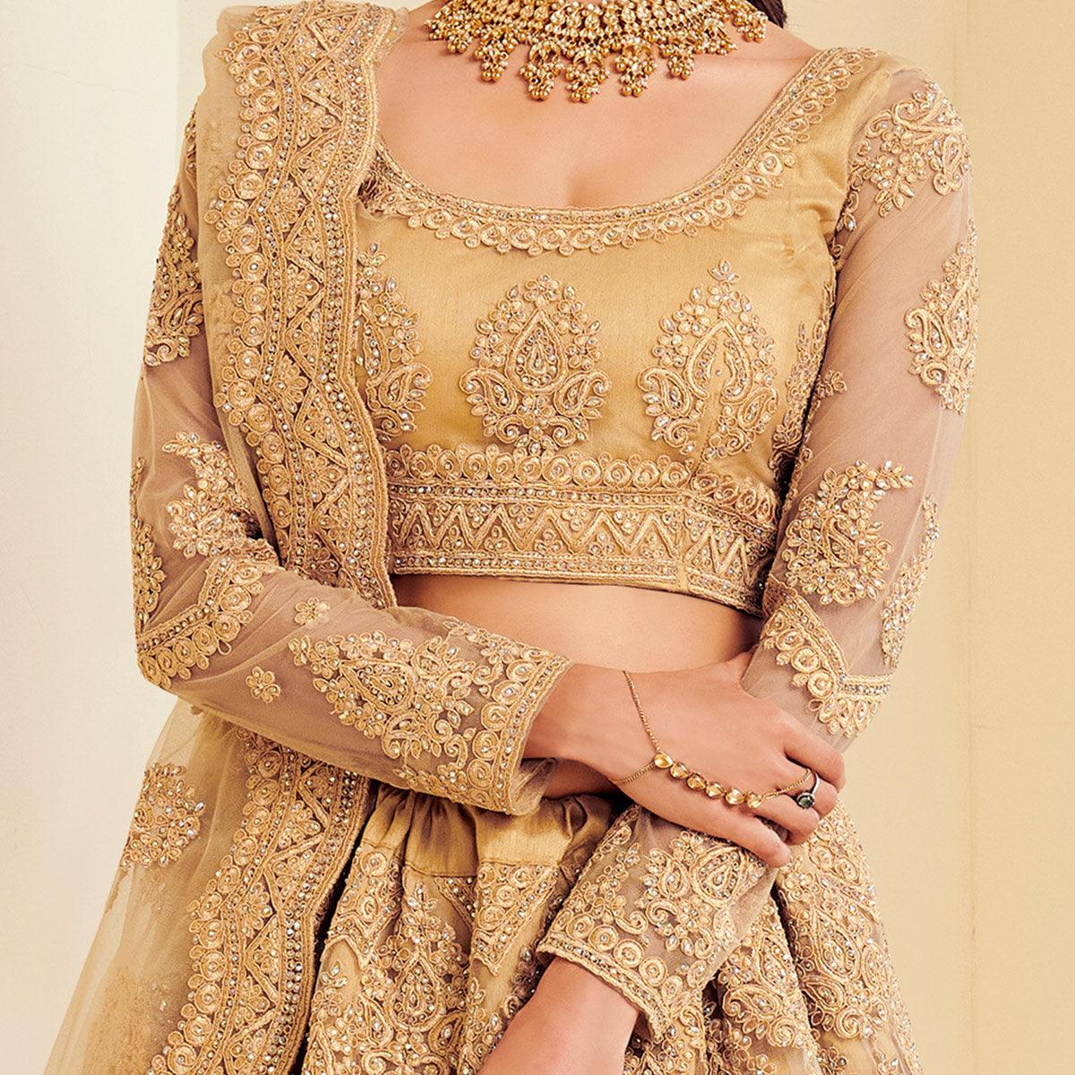 Exotic Golden Coloured Wedding Wear Cording Embroidered Net Lehenga Choli
