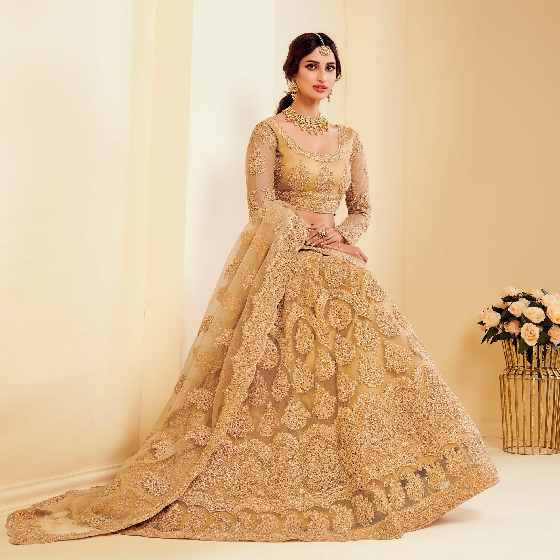 Exotic Golden Coloured Wedding Wear Cording Embroidered Net Lehenga Choli