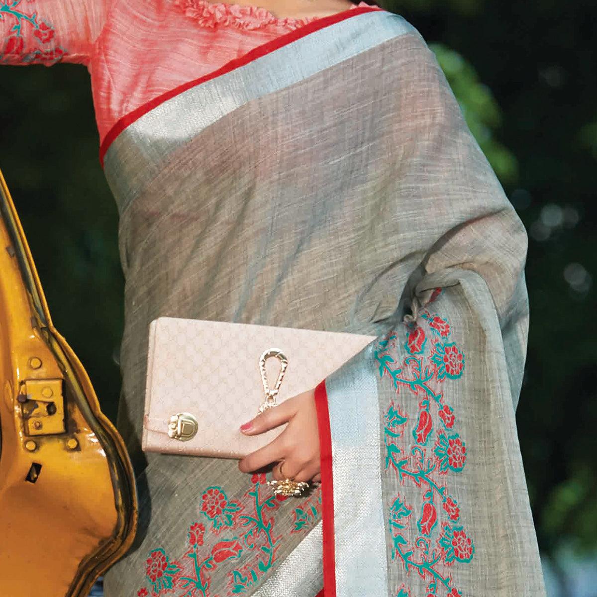 Exotic Grey Colored Festive Wear Floral Embroidered Linen Saree With Tassels