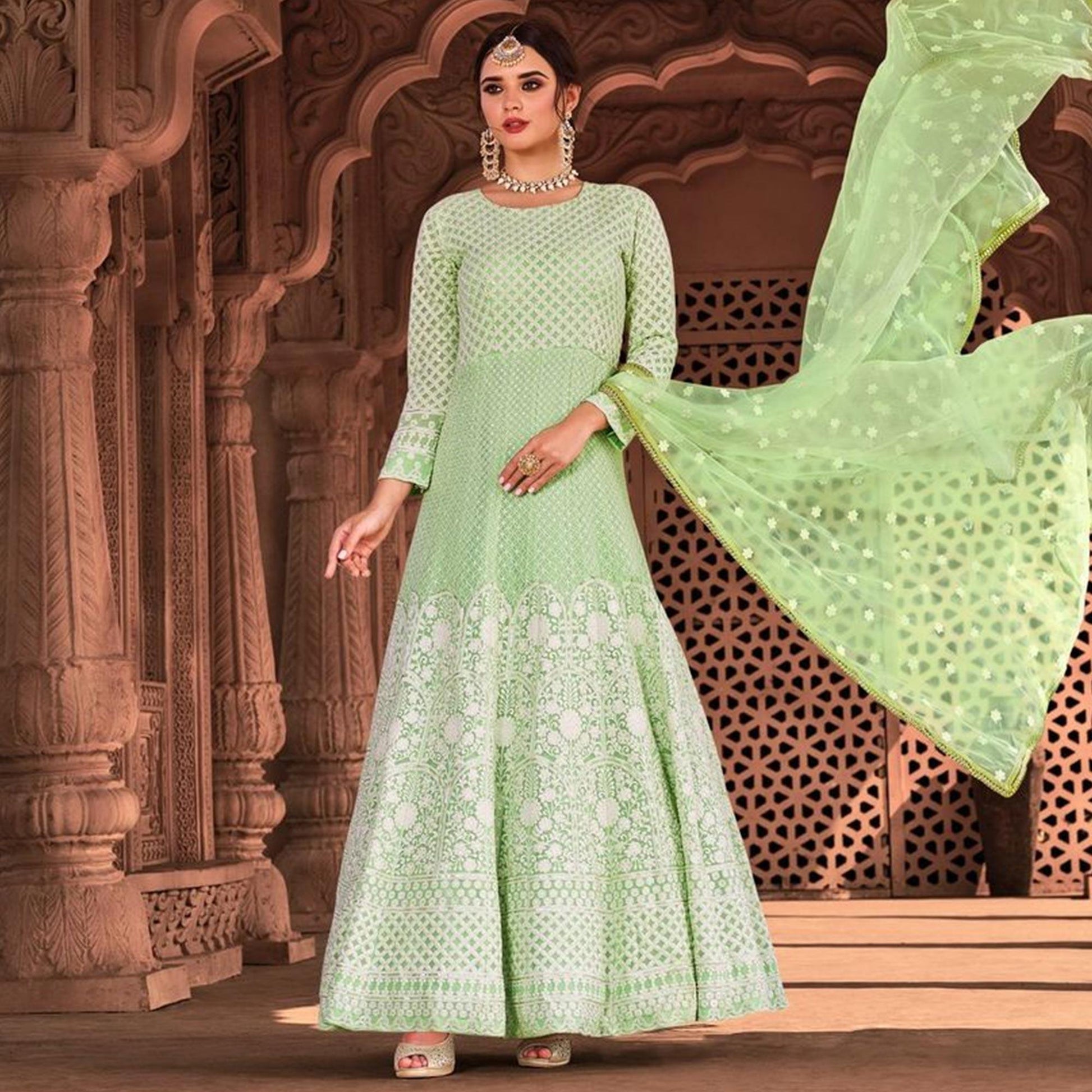 Exotic Light Green Colored Partywear Embroidered Pure Viscose Georgette Anarkali Suit