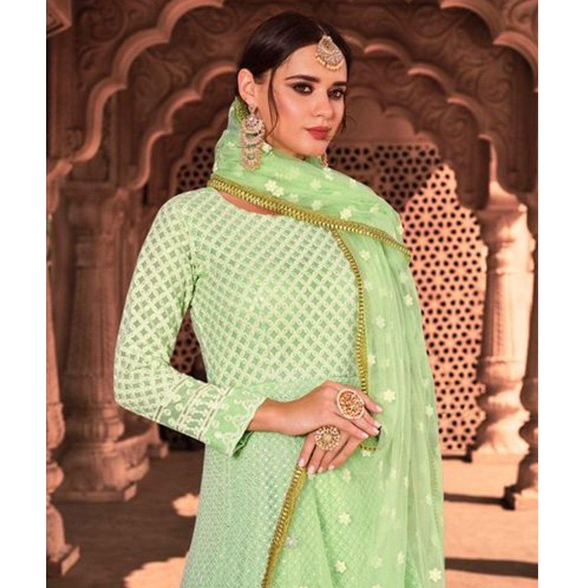 Exotic Light Green Colored Partywear Embroidered Pure Viscose Georgette Anarkali Suit