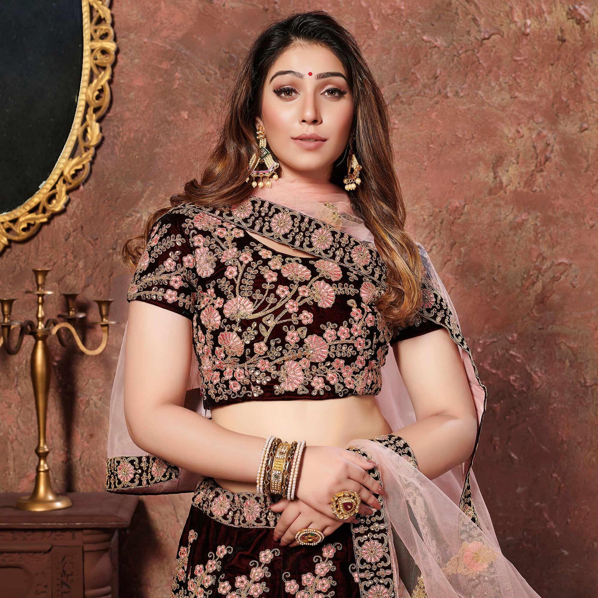 Exotic Maroon Colored Wedding Wear Embroidered Pure Velvet Lehenga Choli