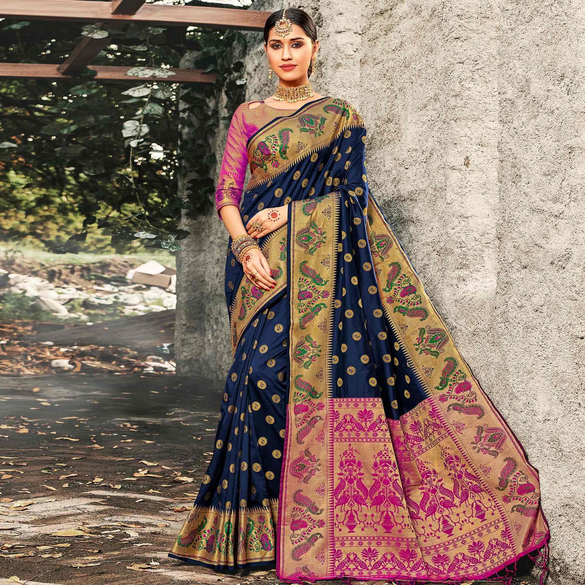 Exotic Navy Blue Colored Festive Wear Woven Banarasi Silk Saree With Tassels