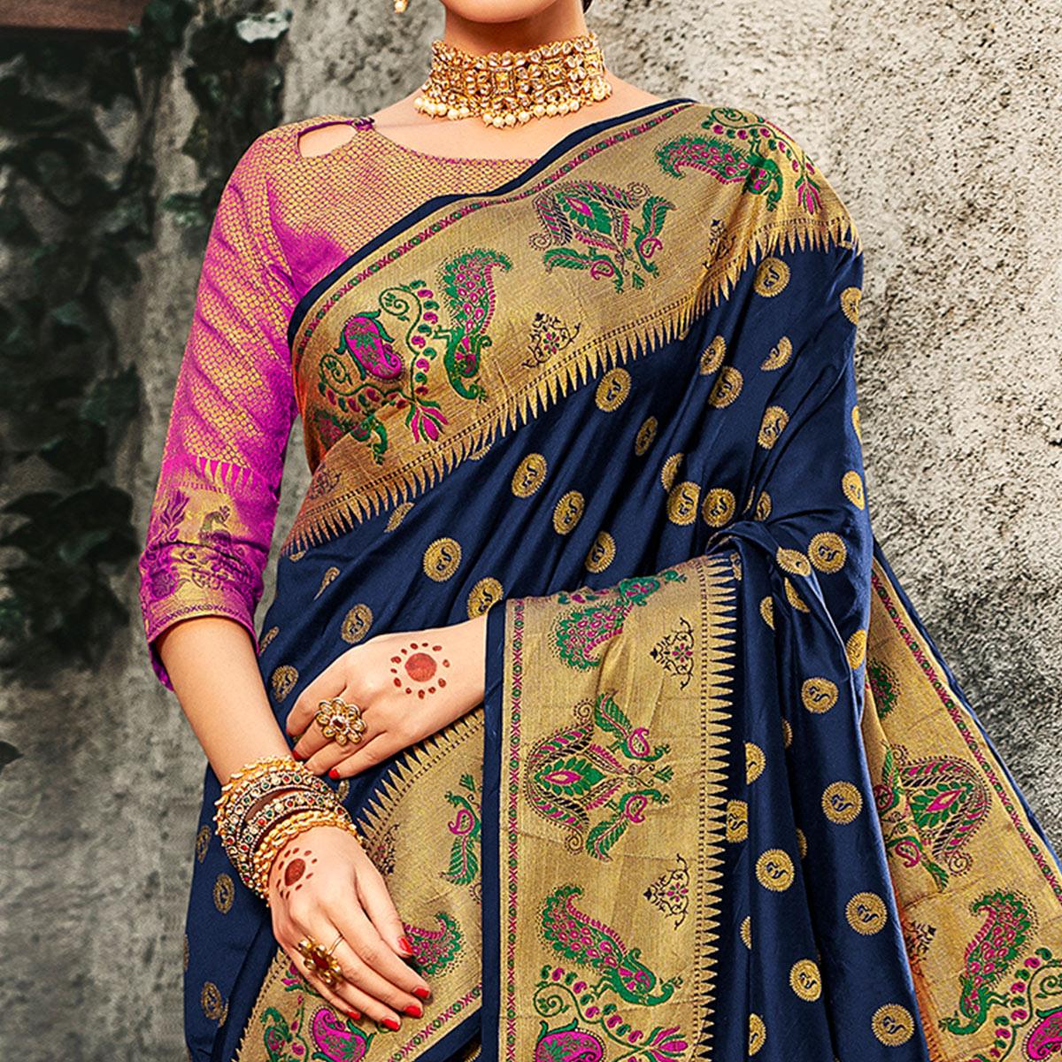 Exotic Navy Blue Colored Festive Wear Woven Banarasi Silk Saree With Tassels