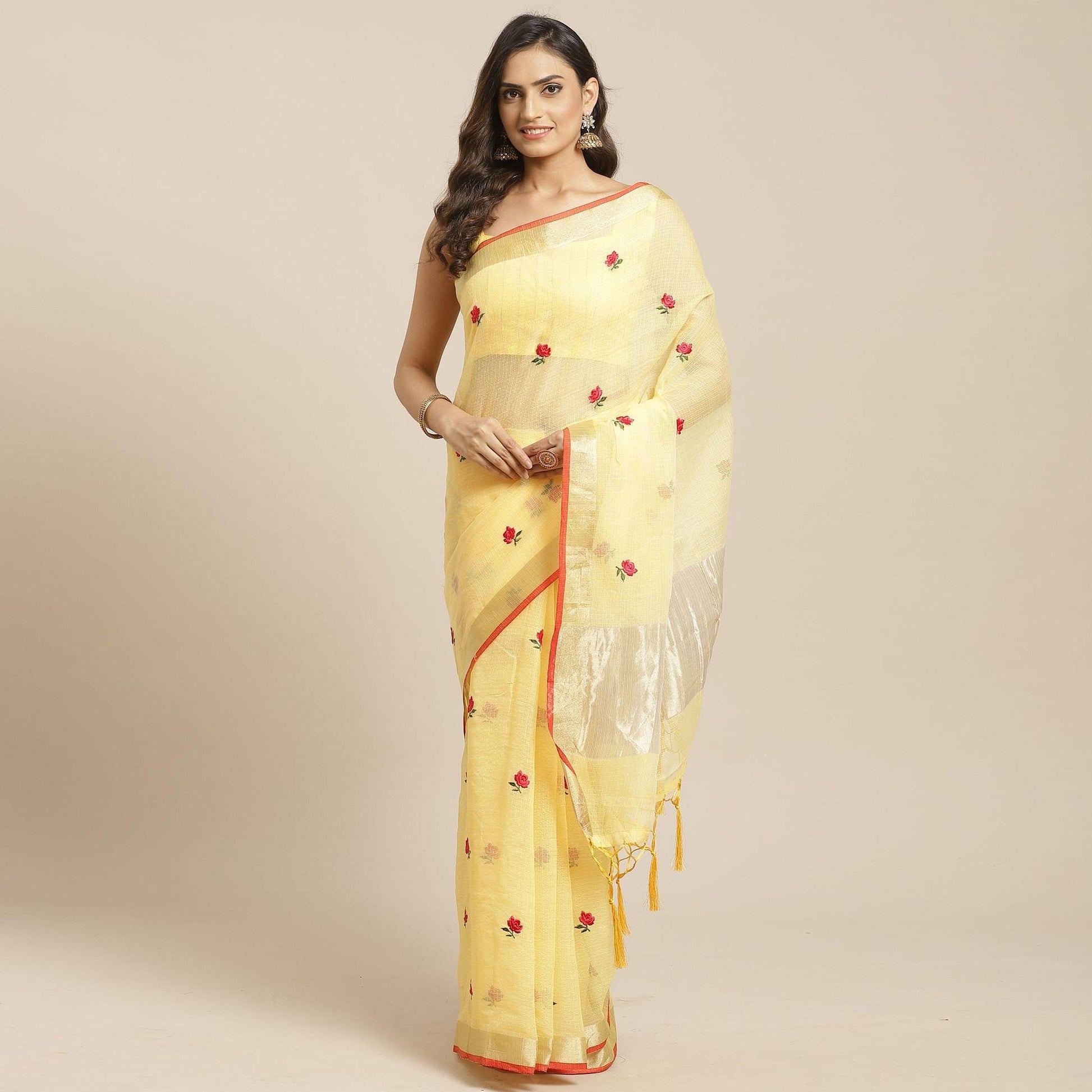 Exotic Yellow Colored Casual Wear Floral Embroidered Silk Saree With Tassels