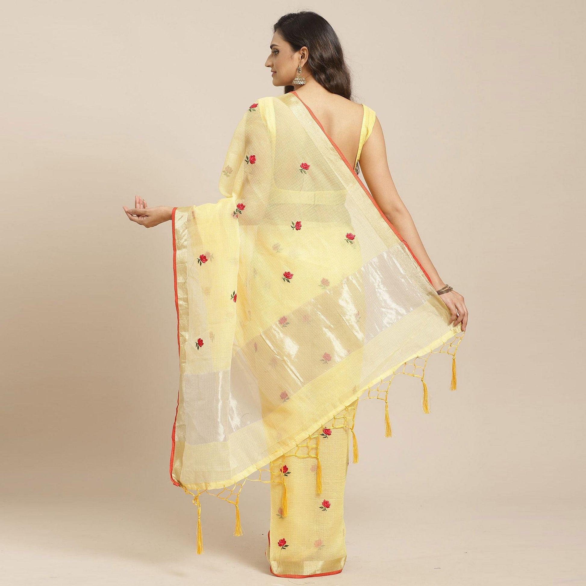 Exotic Yellow Colored Casual Wear Floral Embroidered Silk Saree With Tassels
