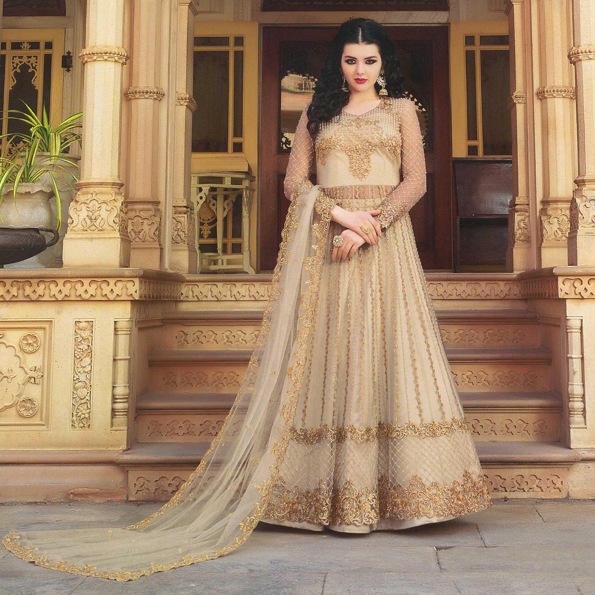 Eye-catching Beige Colored Partywear Embroidered Netted Anarkali With Dual Bottom