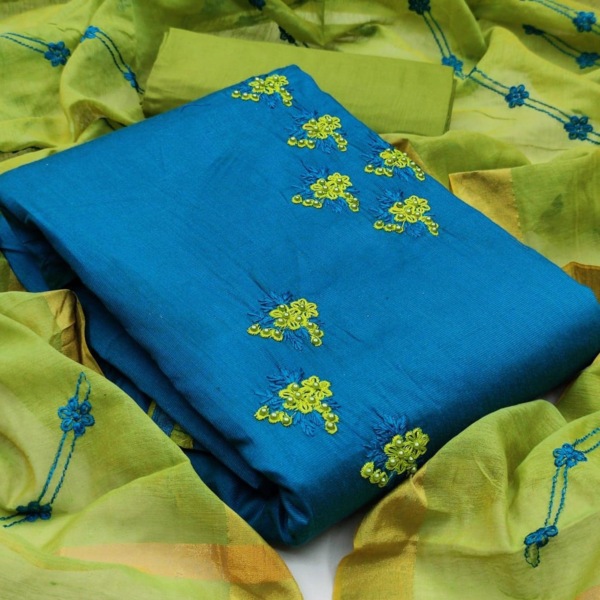 Eye-catching Firozi Colored Casual Wear Embroidered Cotton Dress Material