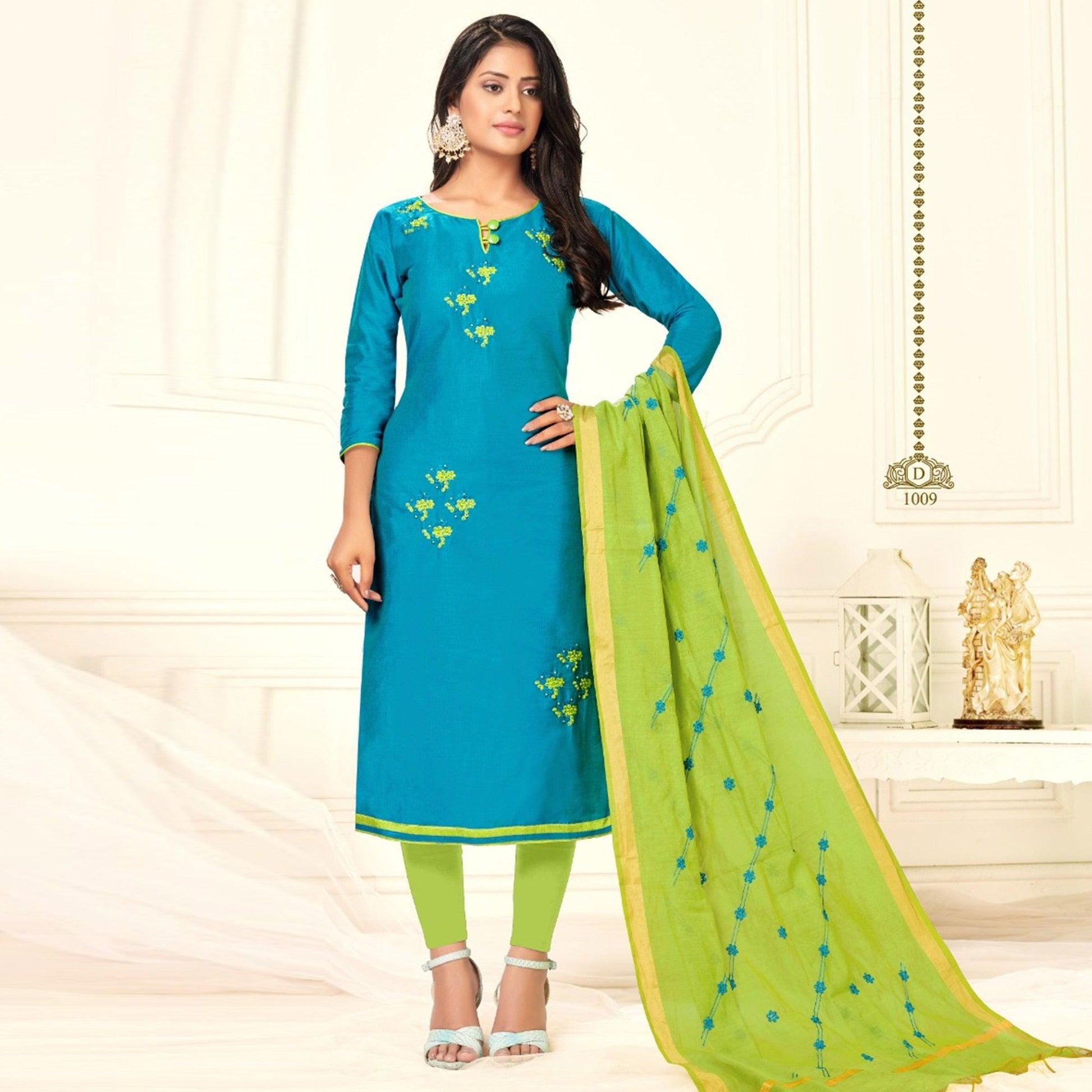 Eye-catching Firozi Colored Casual Wear Embroidered Cotton Dress Material