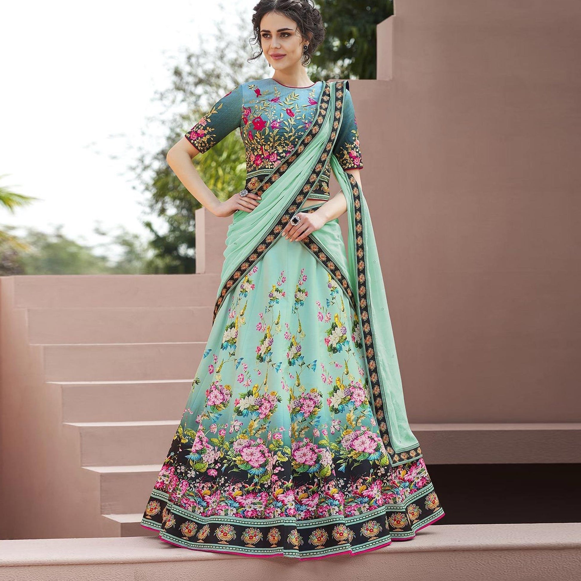 Eye-Catching Mint Green Colored Designer Partywear Embroidered Silk Lehenga Choli