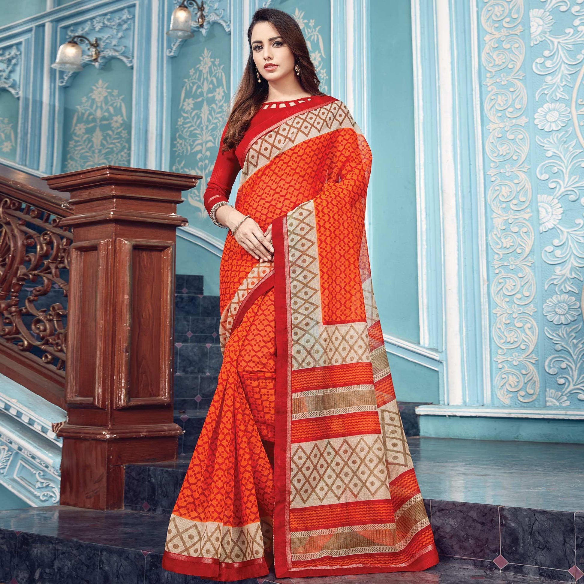 Eye-catching Orange Colored Partywear Printed Silk Saree
