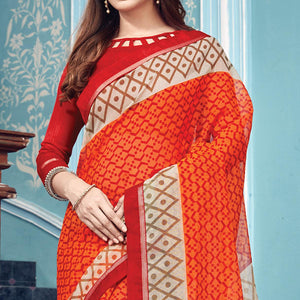 Eye-catching Orange Colored Partywear Printed Silk Saree