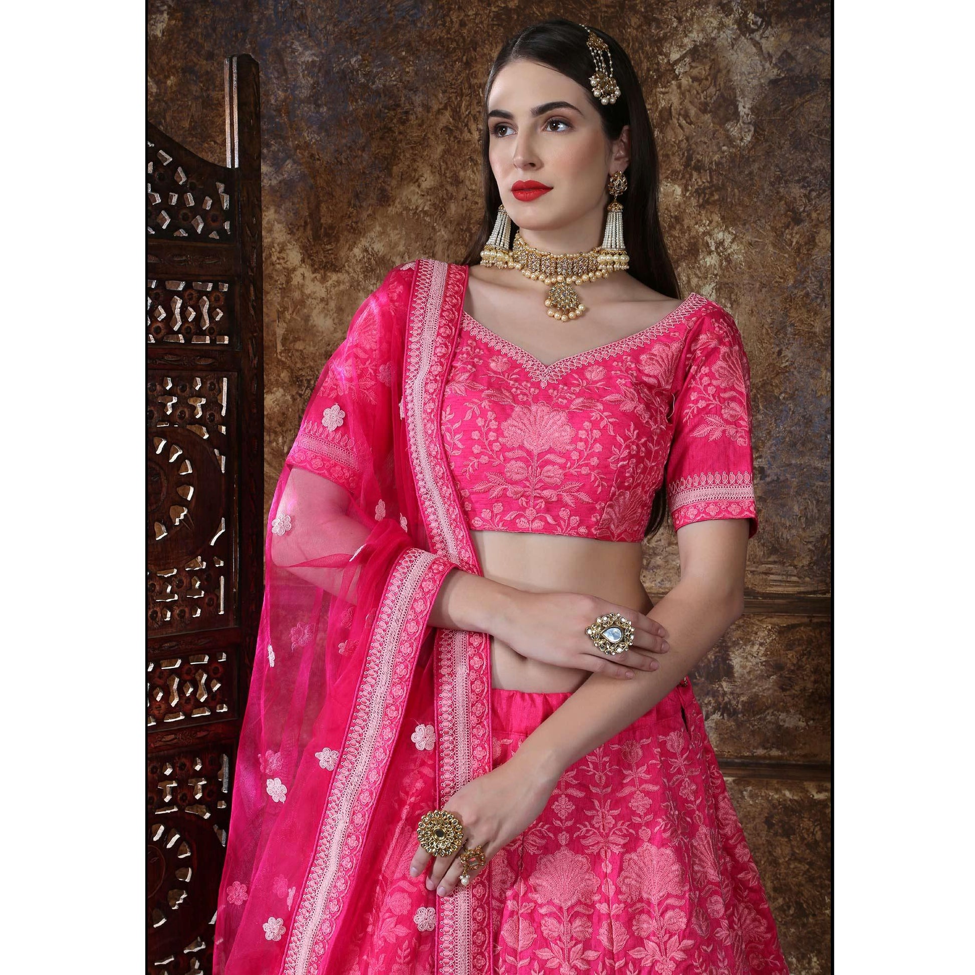 Eye-catching Pink Colored Partywear Embroidered Silk Lehenga Choli