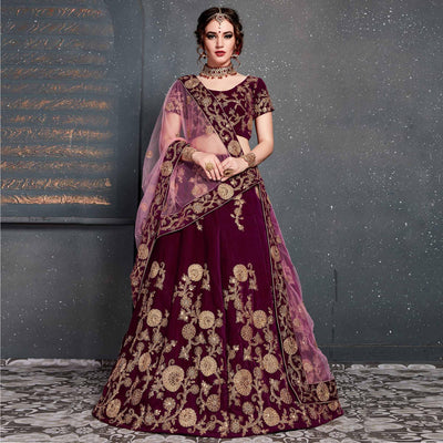 Eye-catching Purple Colored Wedding Wear Embroidered Velvet Lehenga Choli