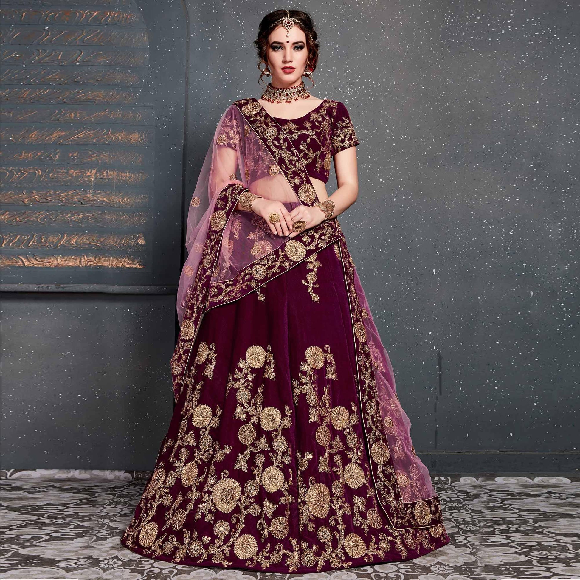 Eye-catching Purple Colored Wedding Wear Embroidered Velvet Lehenga Choli