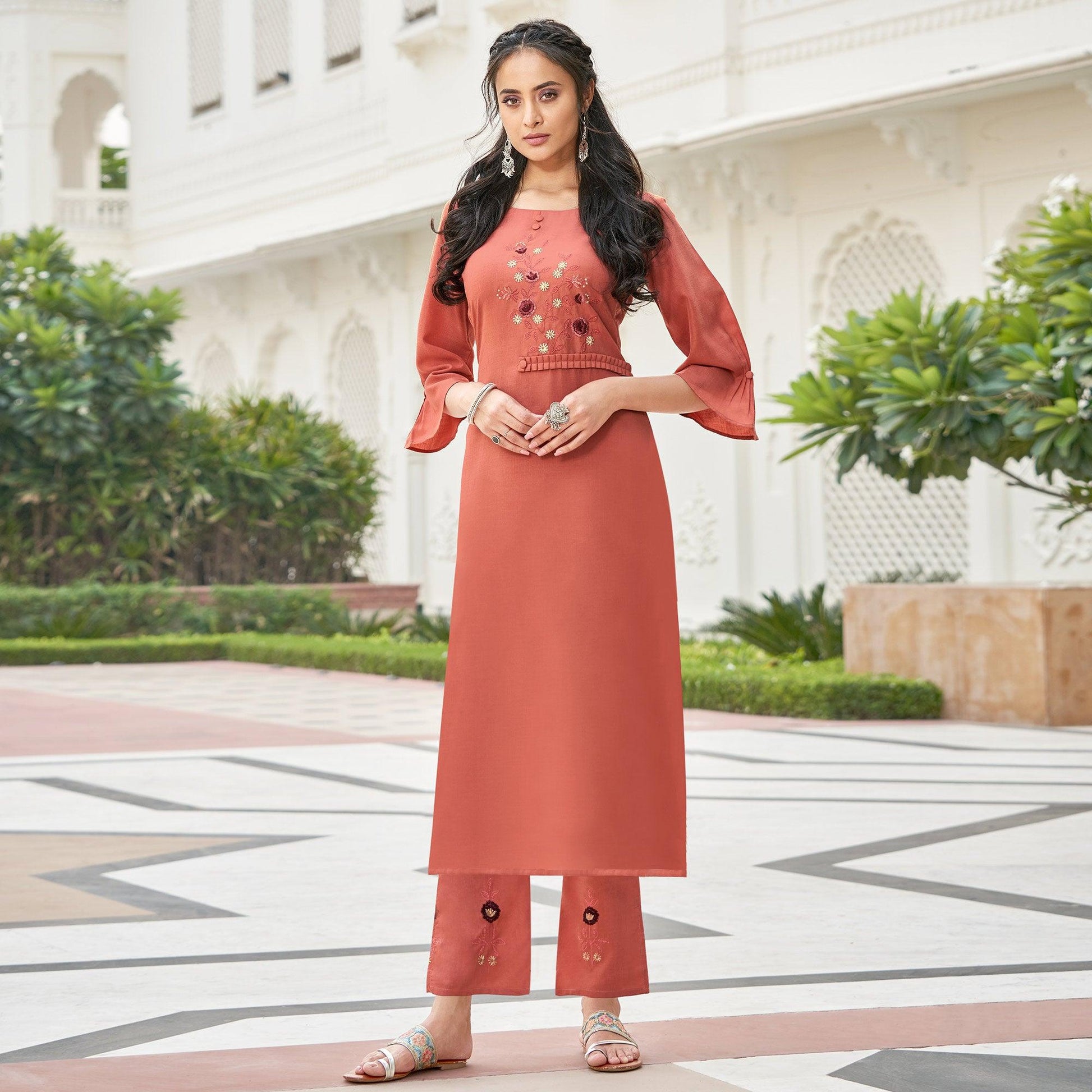 Eye-catching Rust Orange Colored Partywear Embroidered Cotton Slub Kurti Palazzo Set