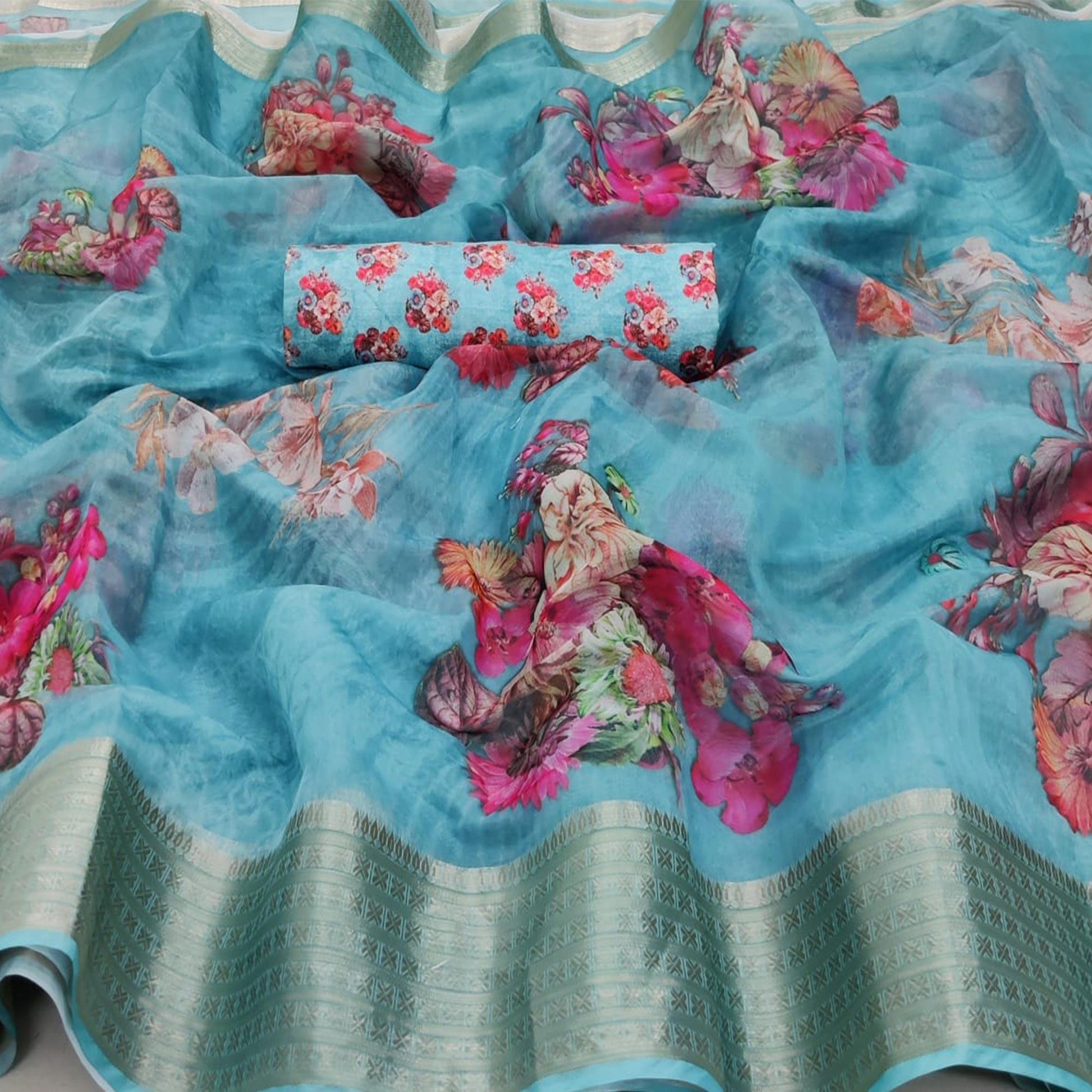 Eye-catching Sky Blue Colored Partywear Digital Printed Georgette Saree