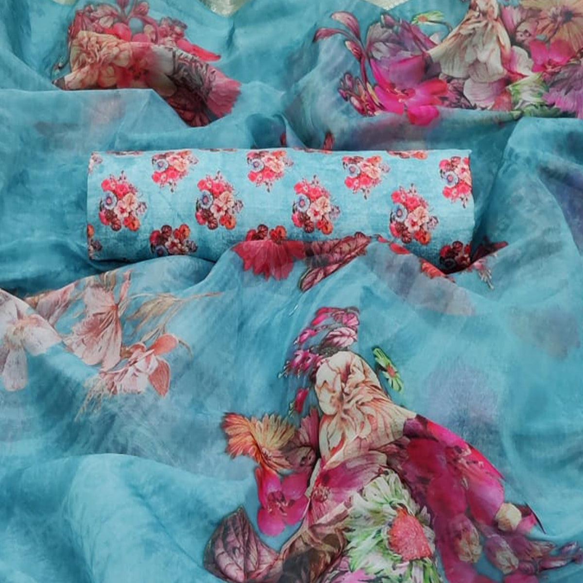 Eye-catching Sky Blue Colored Partywear Digital Printed Georgette Saree