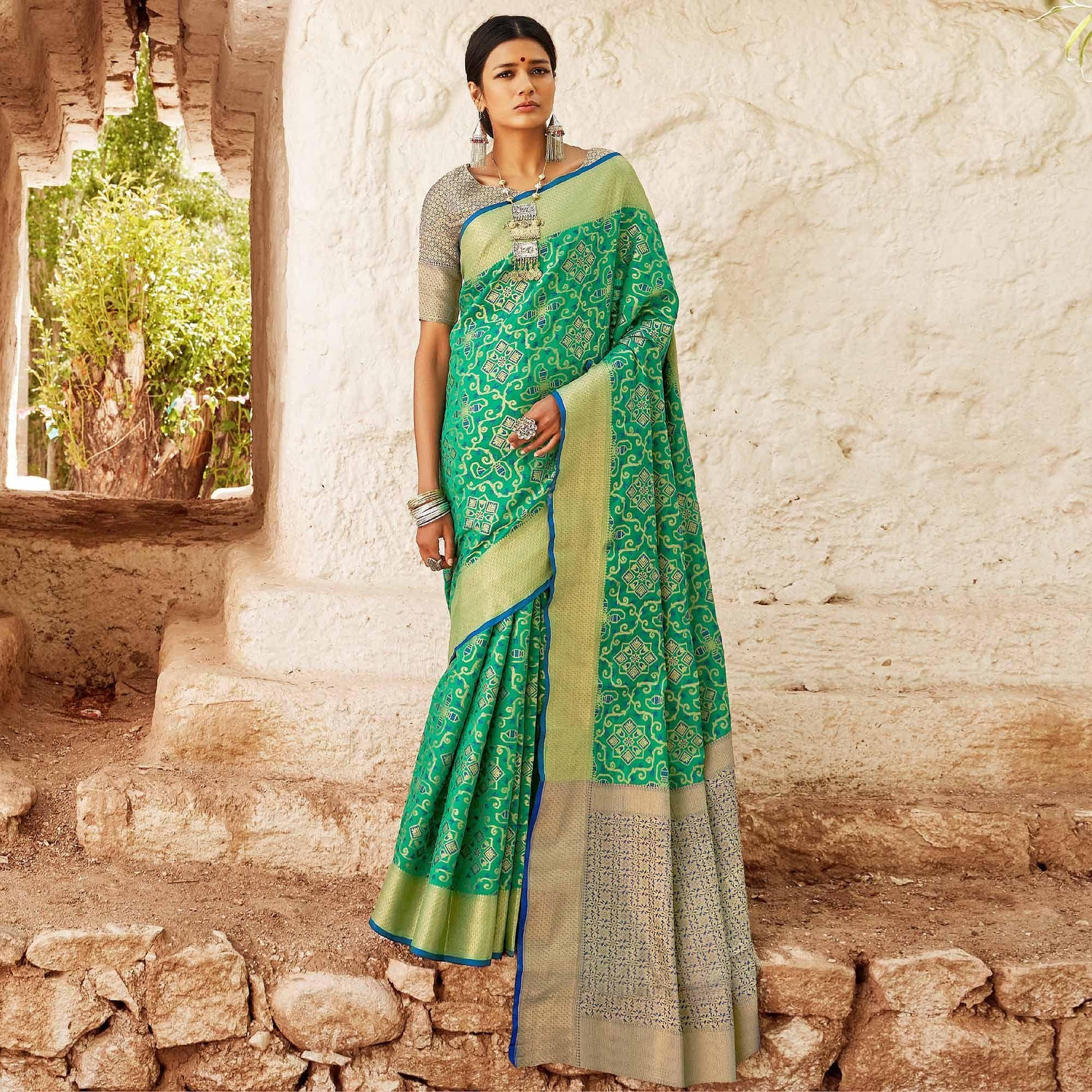 Eye-catching Turquoise Green Colored Festive Wear Woven Silk Saree