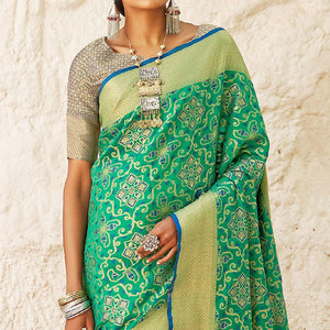 Eye-catching Turquoise Green Colored Festive Wear Woven Silk Saree
