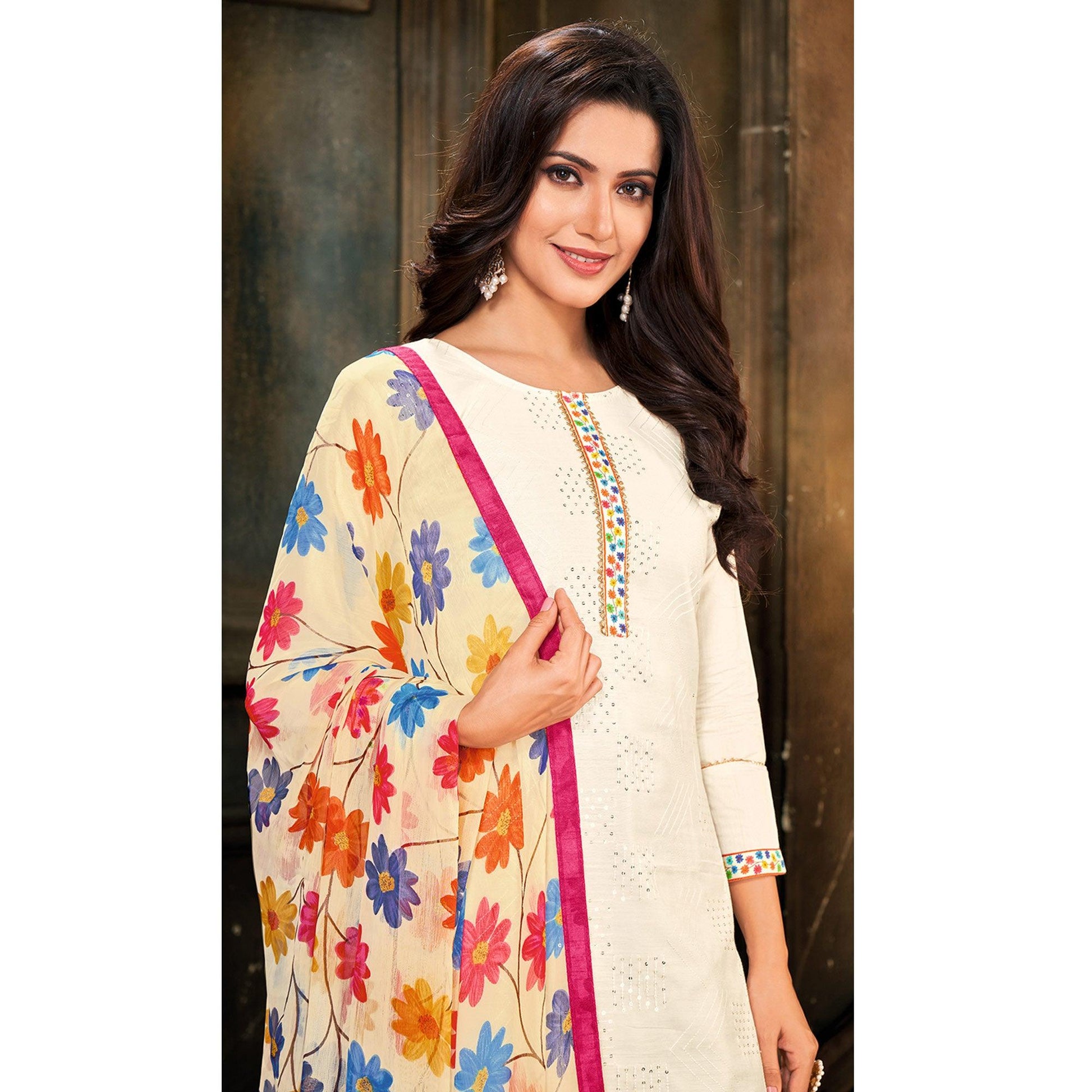 Eye-catching White Colored Partywear Embroidered Chanderi Dress Material