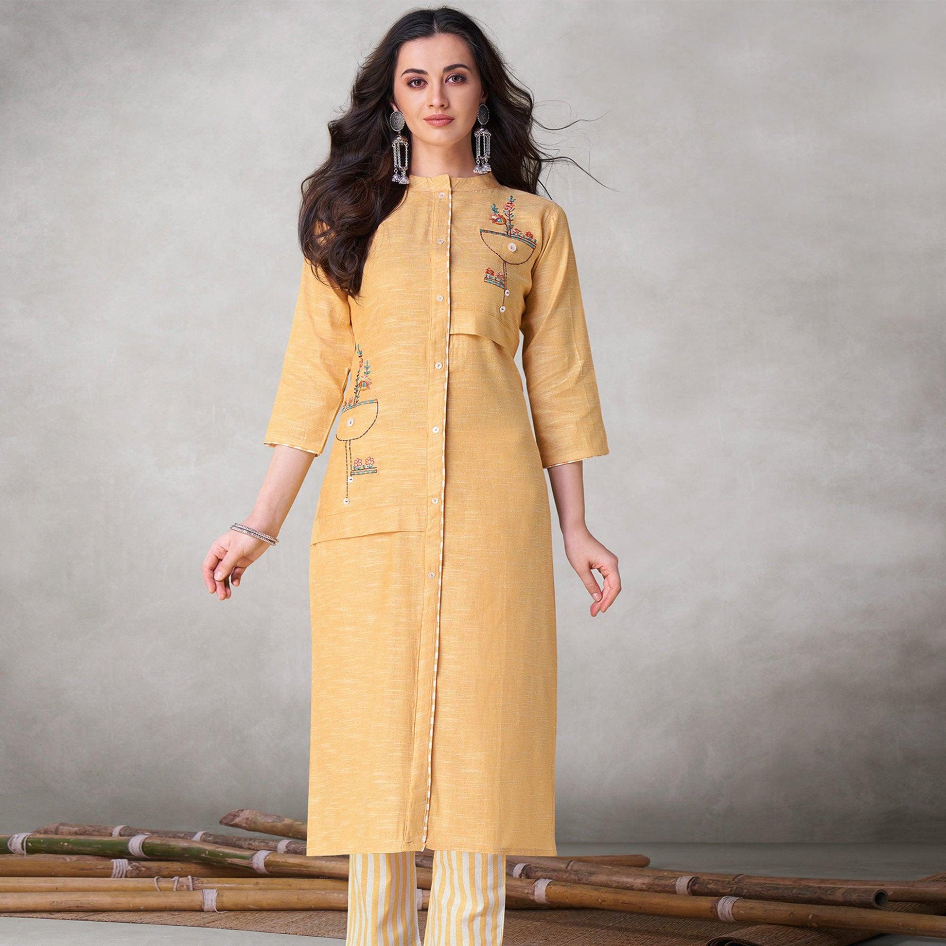 Eye-catching Yellow Colored Party Wear Embroidered Self Weaved Cotton Kurti Pant Set