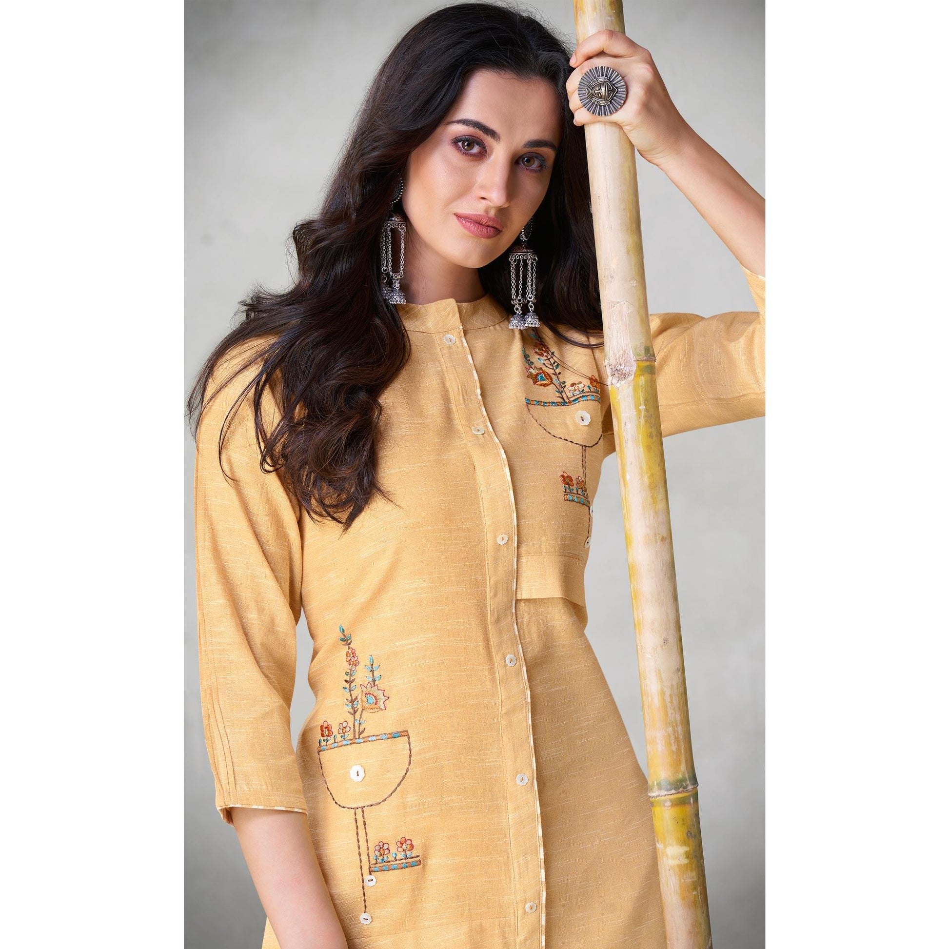 Eye-catching Yellow Colored Party Wear Embroidered Self Weaved Cotton Kurti Pant Set