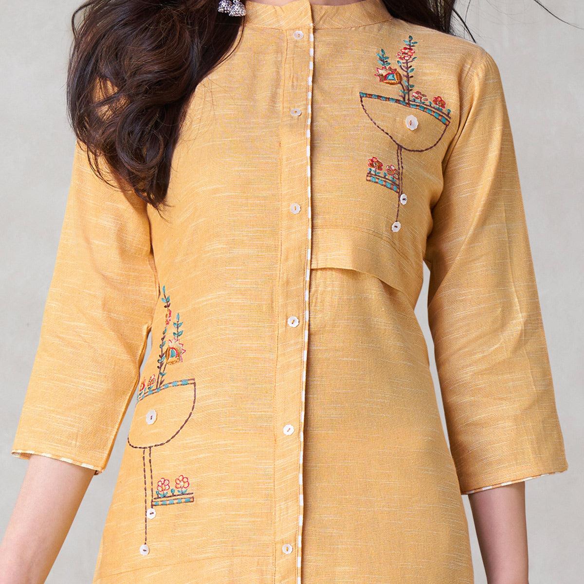 Eye-catching Yellow Colored Party Wear Embroidered Self Weaved Cotton Kurti Pant Set