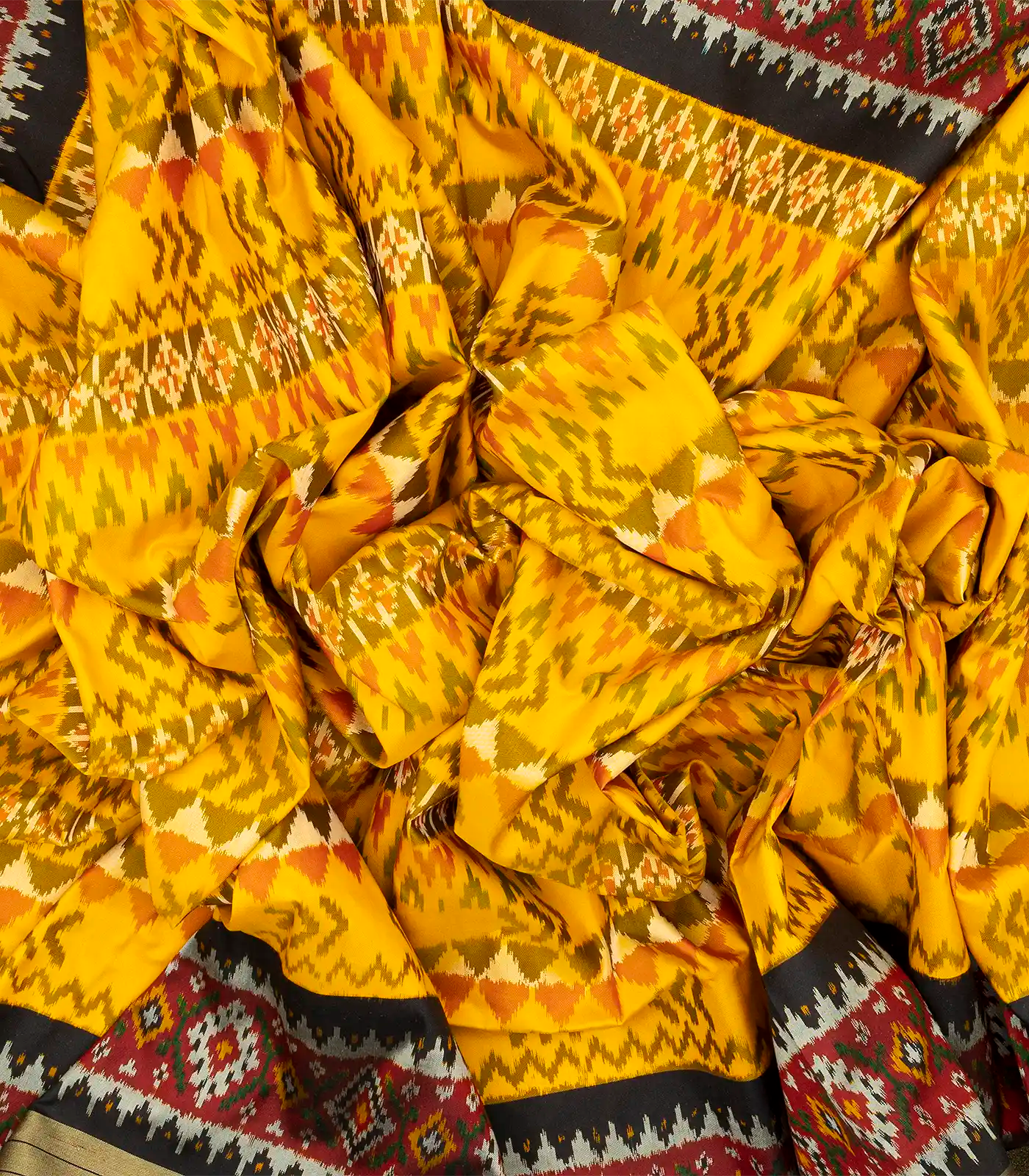 Yellow Handloom Ikat Silk Saree With Contrast Black Border