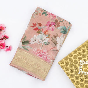 Light Peach Georgette Silk Saree Printed With Floral Motifs & Zari Border