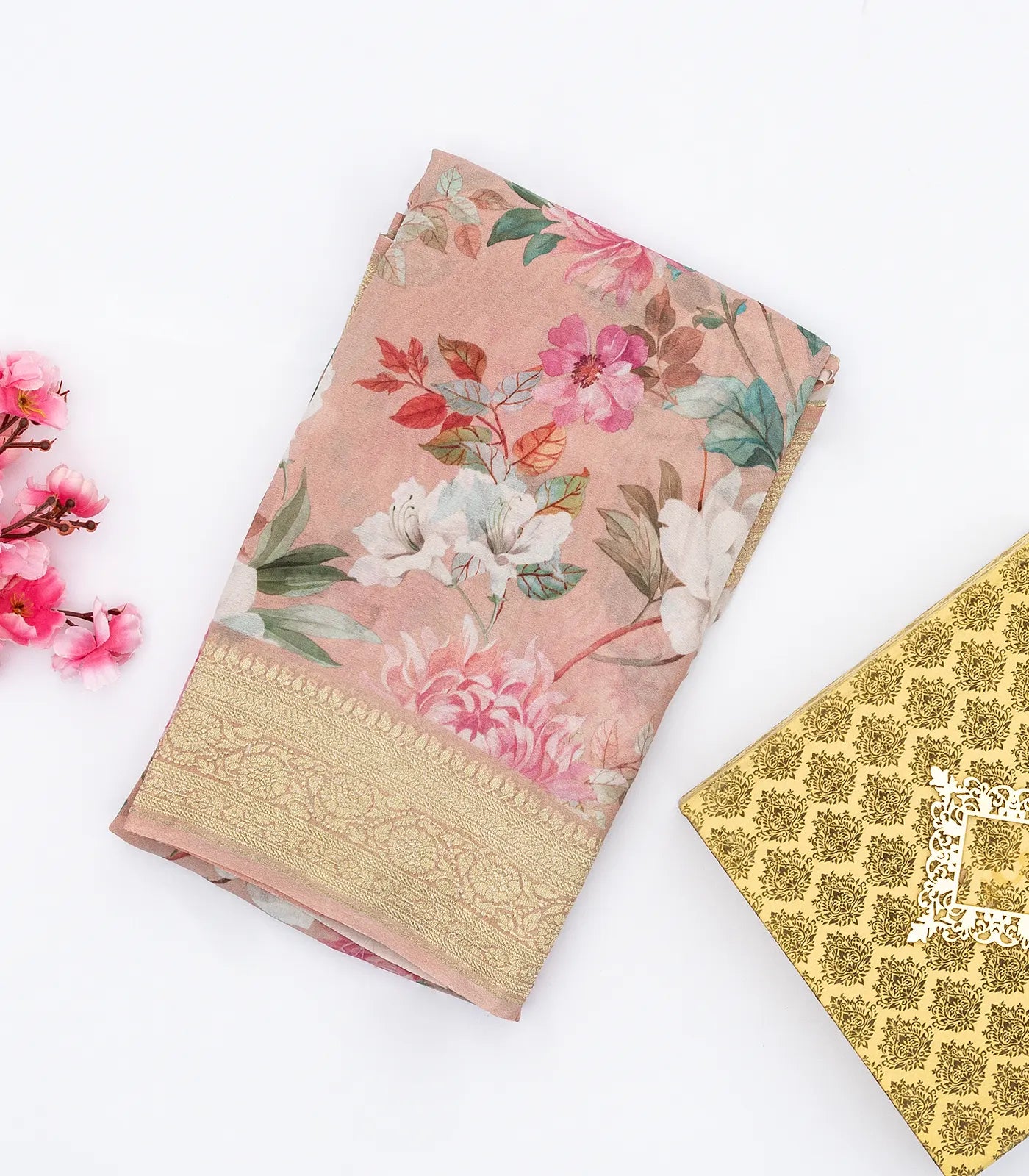 Light Peach Georgette Silk Saree Printed With Floral Motifs & Zari Border