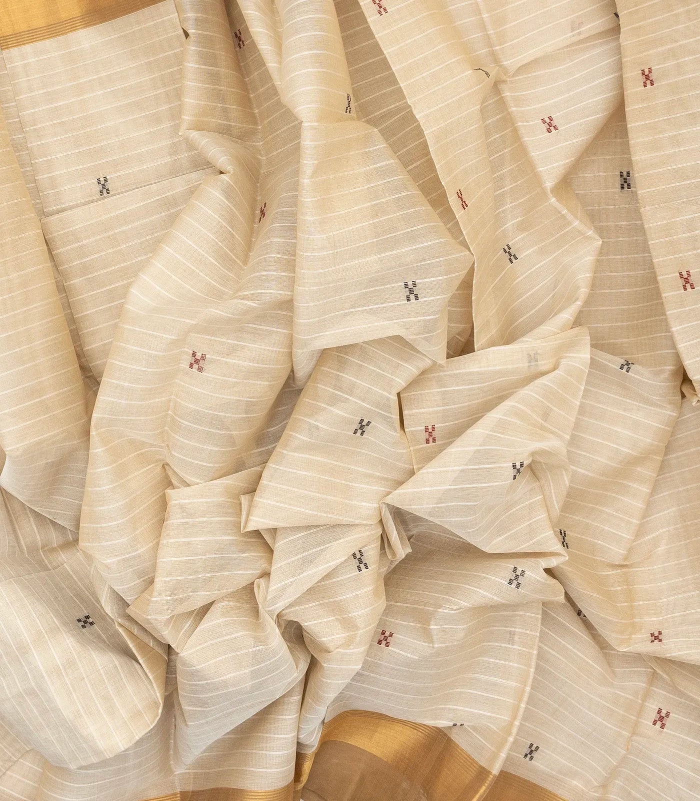 White Handloom Village Cotton Saree With Cross buttas in Red and Black