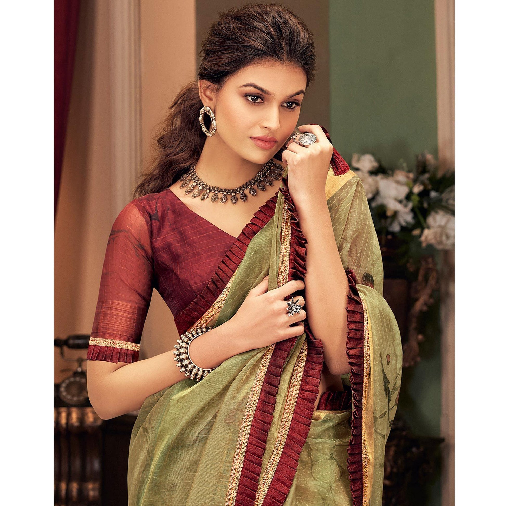 Fantastic Green Colored Festive Wear Printed And Woven Border Silk Saree
