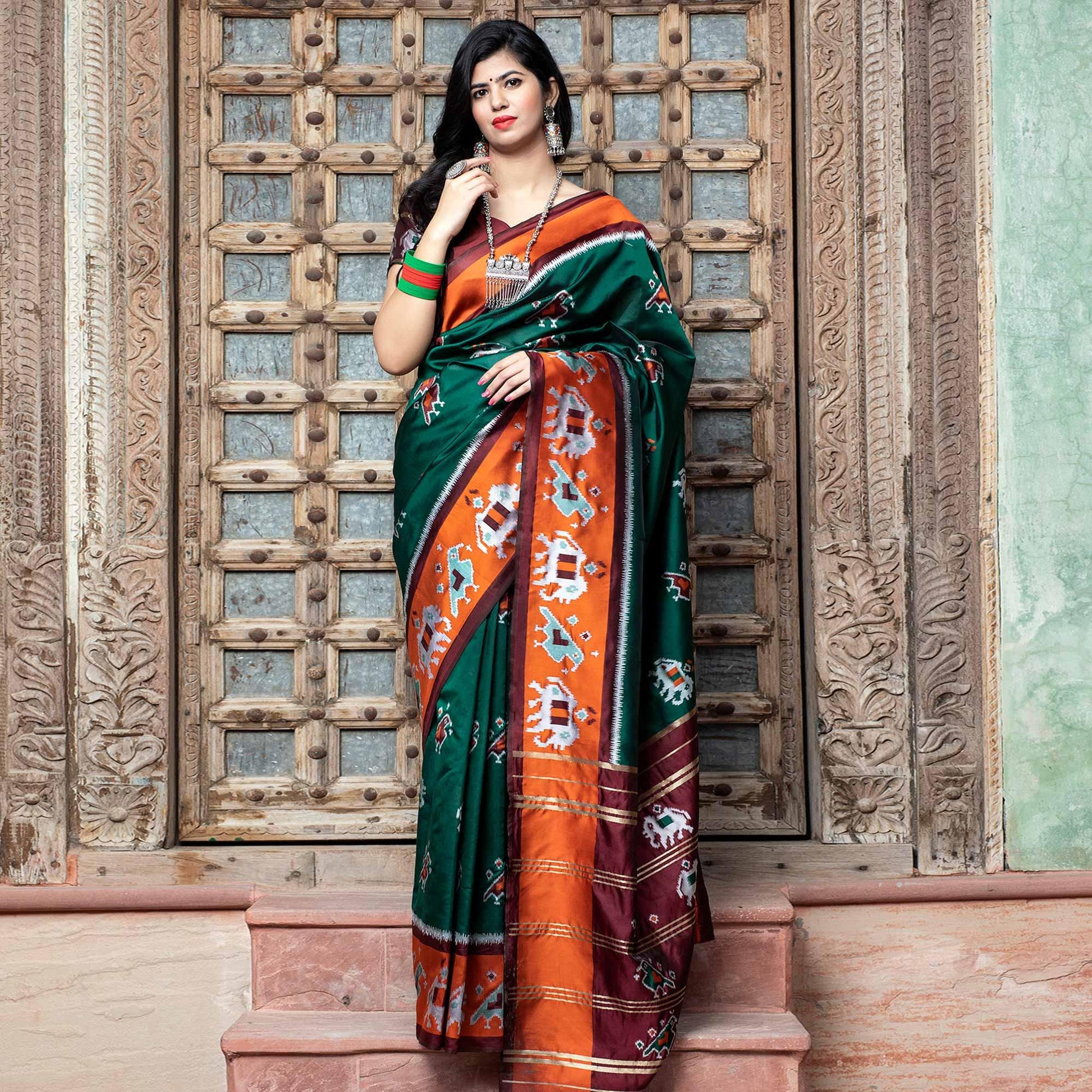 Fantastic Green Colored Festive Wear Woven Patola Silk Saree